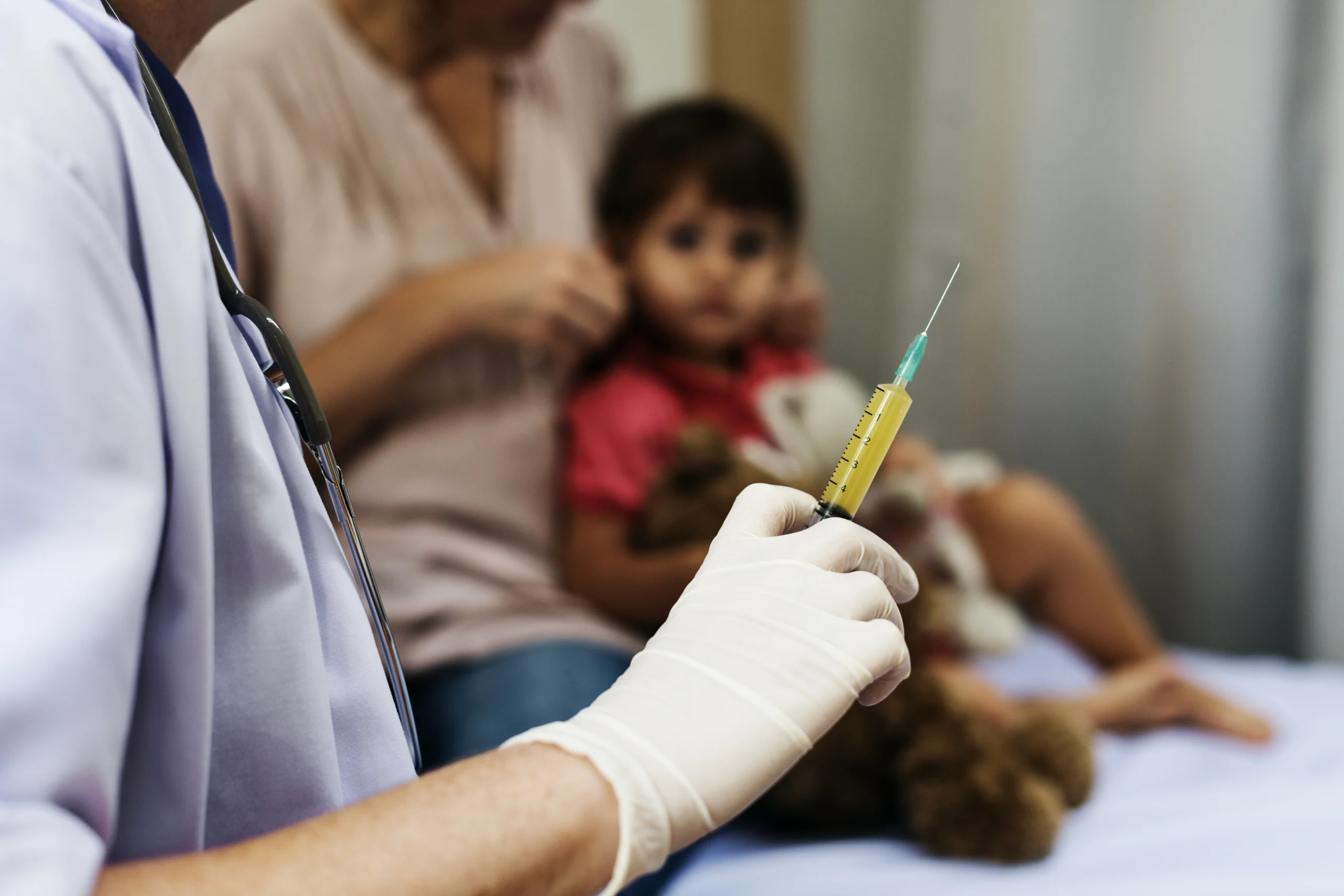 A child is getting ready for child vaccination schedule in jaunpur.